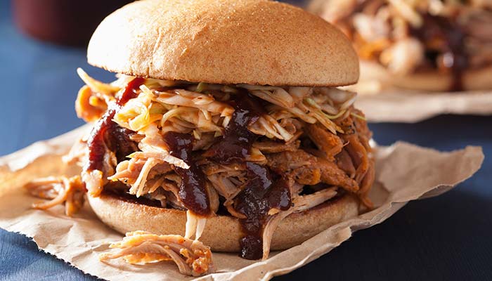 Pulled pork smoked BBQ sandwich served at Cowboy Mac's Country Club Restaurant and Bar located in Green Bay, Wisconsin