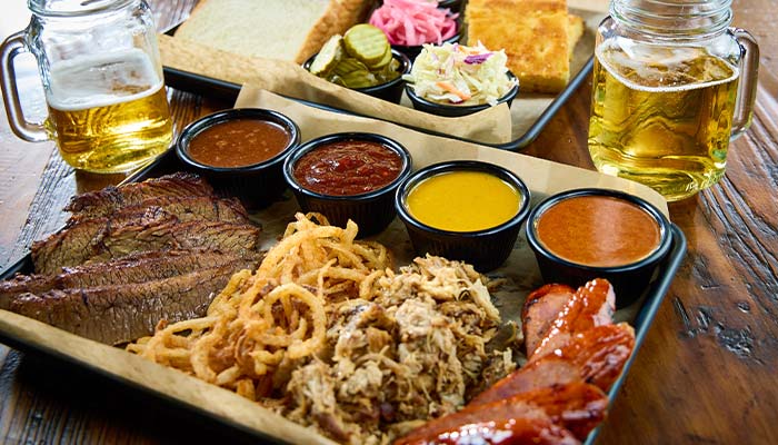 Smoked meat BBQ platter served at Cowboy Mac's Country Club Restaurant and Bar located in Green Bay, Wisconsin