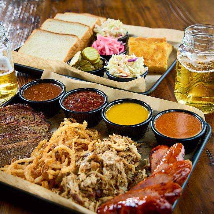 Smoked meat BBQ platter served at Cowboy Mac's Country Club Restaurant and Bar located in Green Bay, Wisconsin