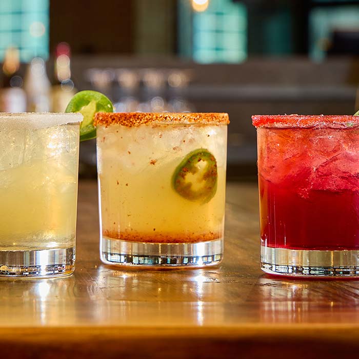 Spicy specialty cocktail fruit margarita served at Cowboy Mac's Country Club Restaurant and Bar located in Green Bay, Wisconsin